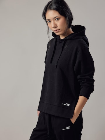 OWN Off With Nature Sweatshirt 'Felpa Felpata con Cappuccio e Spacchi Laterali' in Zwart