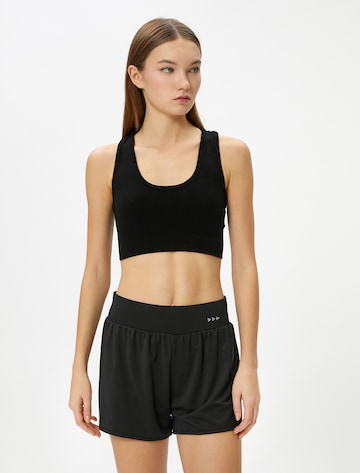 Koton Sports Bra in Black: front