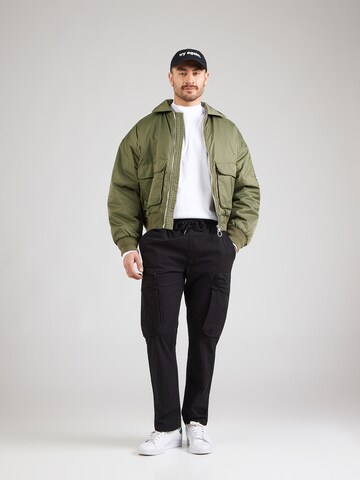 ALPHA INDUSTRIES - regular Pantalón cargo 'Division' en negro