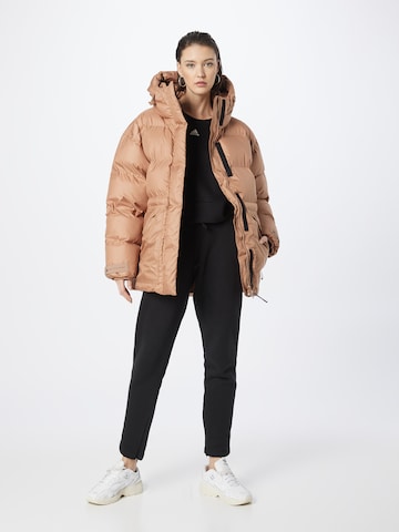 ADIDAS BY STELLA MCCARTNEYSportska jakna 'Mid- Padded Winter' - smeđa boja