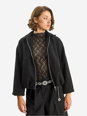 Bianco Lucci Tussenjas in Zwart: voorkant