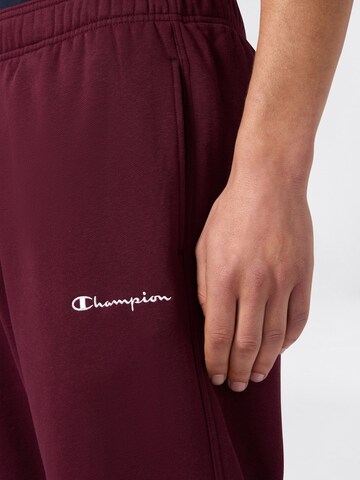 Champion Authentic Athletic Apparel Regular Housut värissä punainen