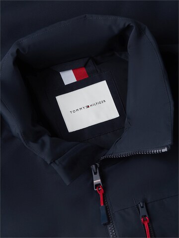 TOMMY HILFIGER Tussenjas in Blauw