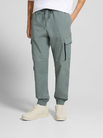 Bershka Tapered Cargo Pants in Blue: front