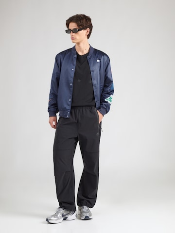 Nike Sportswear Tussenjas 'CLUB VARSITY' in Blauw