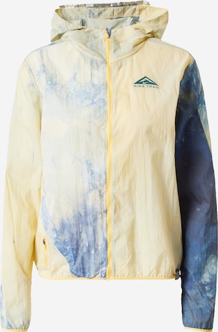 Veste de sport 'W NK TRAIL JACKET' NIKE en jaune : devant