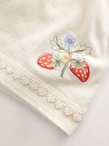 Next Set: Bluse und Shorts in Beige