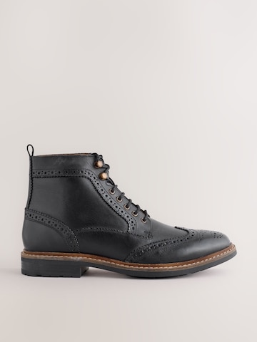 Boots stringati di Next in nero
