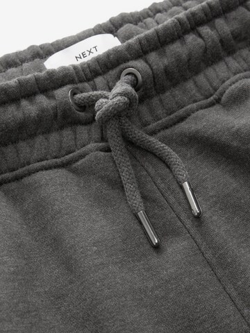 Next Дънки Tapered Leg Панталон в сиво