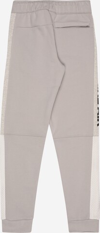 Nike Sportswear Tapered Pants in Grey