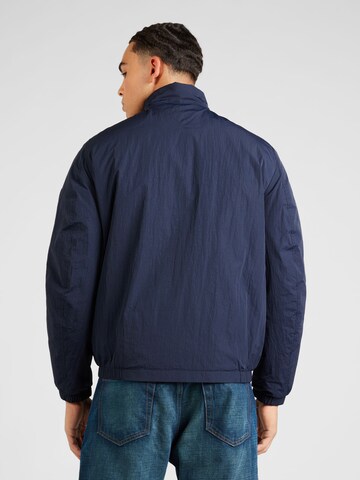 Veste mi-saison TOMMY HILFIGER en bleu