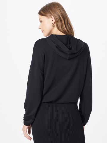 Sweat-shirt 'Samara' ABOUT YOU en noir