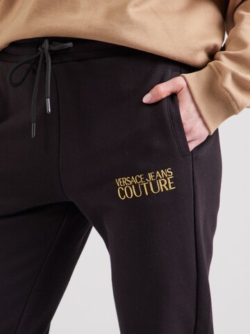 Effilé Pantalon Versace Jeans Couture en noir