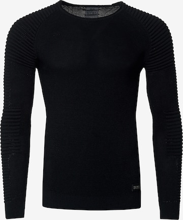 Rusty Neal Figurbetonter Feinstrick Pullover in Schwarz: predná strana