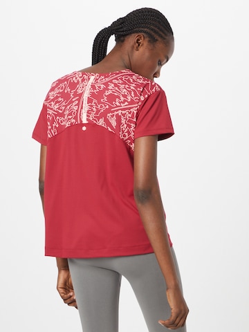 T-shirt fonctionnel UNDER ARMOUR en rouge