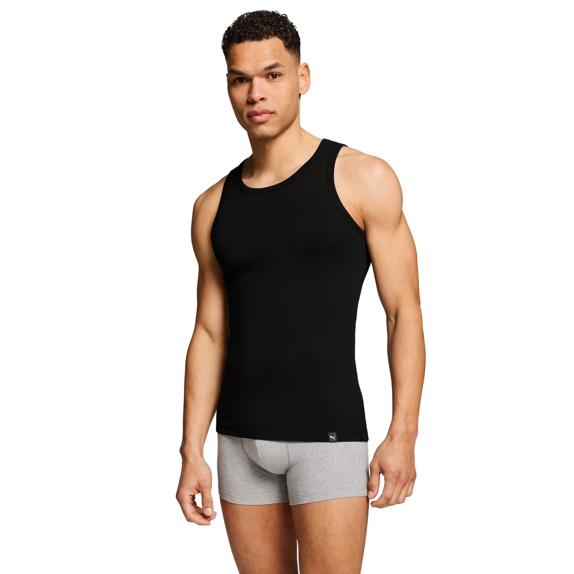 PUMA - Camiseta en negro: frente