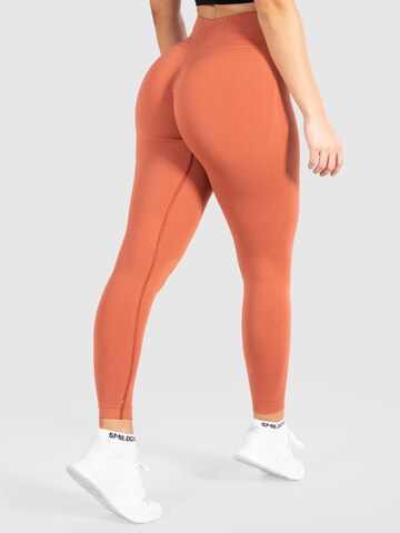 Smilodox Skinny Workout Pants 'Amaze Scrunch' in Orange