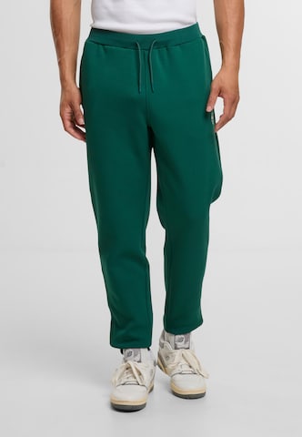 Sergio Tacchini Tapered Hose in Grün: Vorderseite