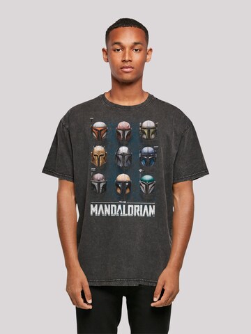 F4NT4STIC Shirt 'Star Wars The Mandalorian Helmets' in Zwart: voorkant