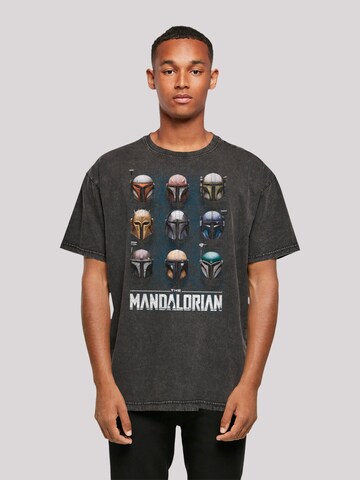 F4NT4STIC T-Shirt 'Star Wars The Mandalorian Helmets' in Schwarz: Vorderseite