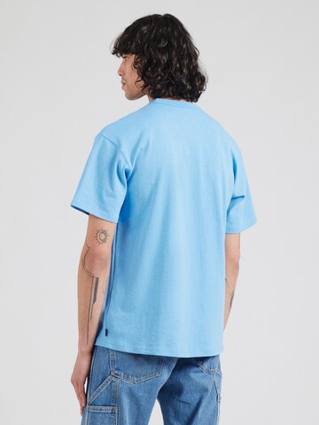 Nike Sportswear Tričko 'PREMIUM ESSENTIALS' – modrá