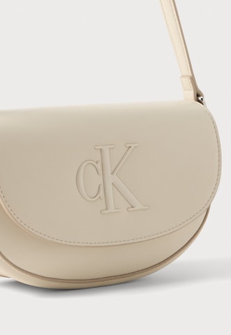 Calvin Klein - Mala de ombro em bege: frente