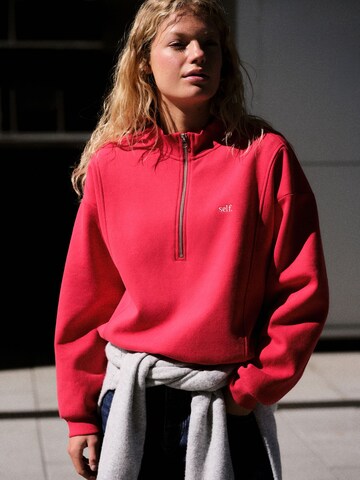 self. Sweatshirt in Red: front