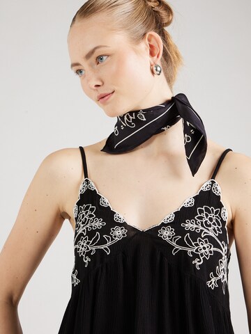 Top 'Ria' di ABOUT YOU in nero