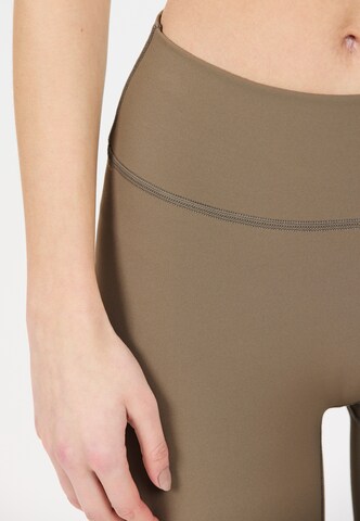 Athlecia Skinny Sports trousers 'Luxe' in Brown