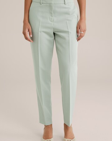 Slimfit Pantaloni con pieghe di WE Fashion in verde: frontale