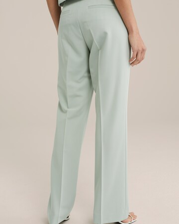 WE Fashion Regular Trousers with creases in Green