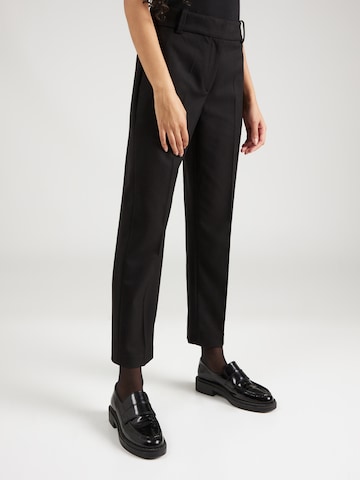 Coupe slim Pantalon à plis TOMMY HILFIGER en noir : devant