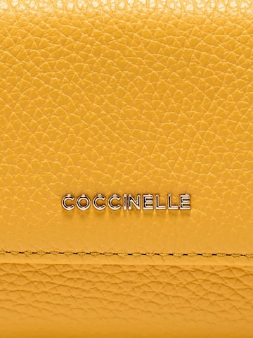 Portamonete 'COCCINELLE' di Coccinelle in giallo