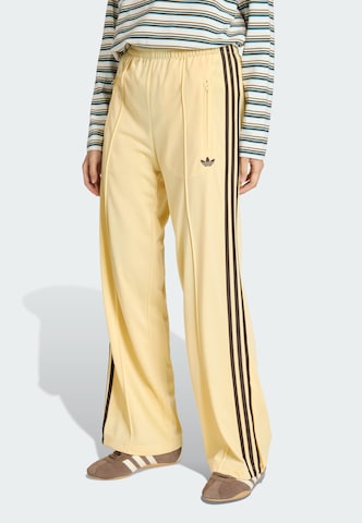 ADIDAS ORIGINALS - Perna larga Calças em laranja: frente