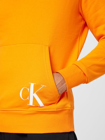 Calvin Klein Jeans Mikina - oranžová