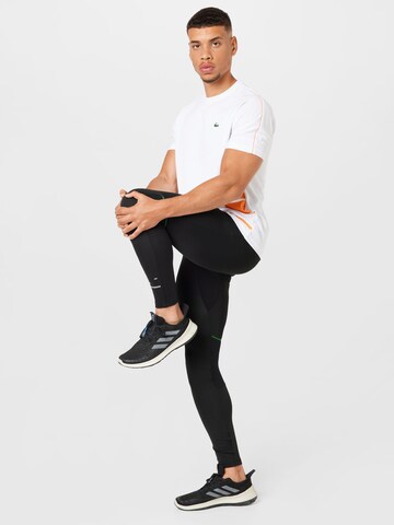 Slimfit Pantaloni sportivi di Lacoste Sport in nero