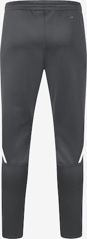Tapered Pantaloni sportivi 'Challenge' di JAKO in grigio