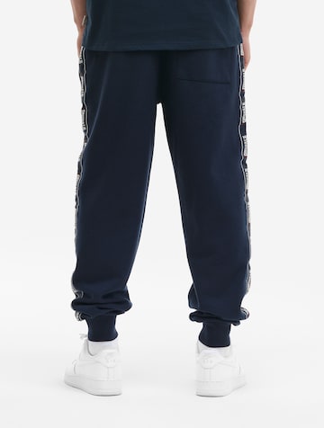 LONSDALE - Tapered Pantalón 'Delaval' en azul