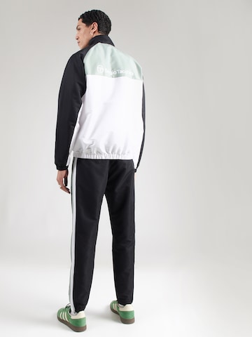 Sergio Tacchini Jooksudress 'Metropolis', värv must