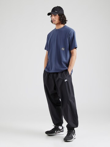 NIKE Performance shirt 'HERITAGE' in Blue