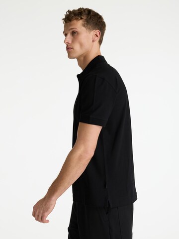 CHASIN' Poloshirt 'Daily' in Schwarz