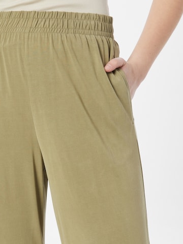 Wide leg Pantaloni di Urban Classics in beige