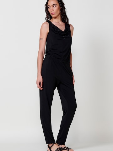 KOROSHI - Jumpsuit en negro: frente