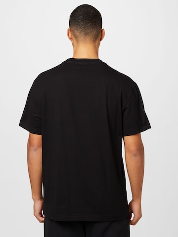 Tricou de la WEEKDAY pe negru