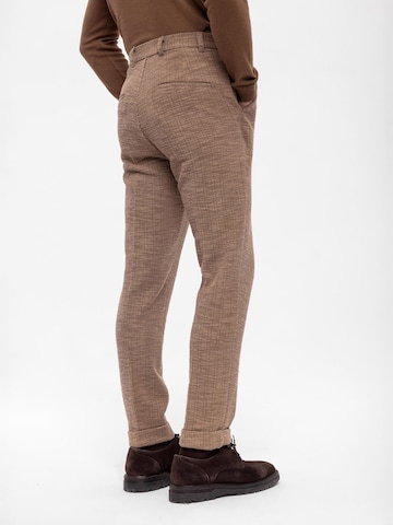 Antioch Tapered Pleat-front trousers in Brown