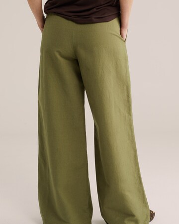 WE Fashion Широкий Штаны в Зеленый