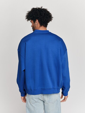 Sweat-shirt 'Inning' LYCATI exclusive for ABOUT YOU en bleu