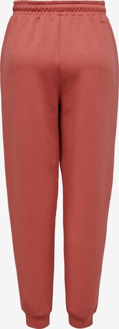 ONLY PLAY Tapered Workout Pants in Red: front