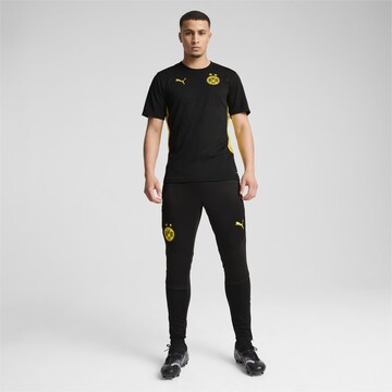 PUMA Slim fit Sports trousers in Black