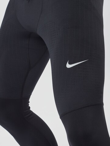 NIKE Skinny Sporthose 'Phenom' in Schwarz